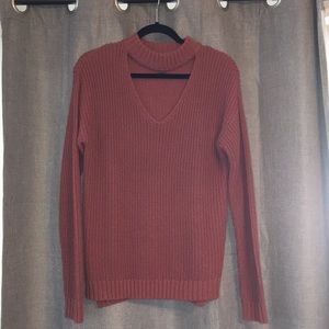 Sweater with V neck cut out